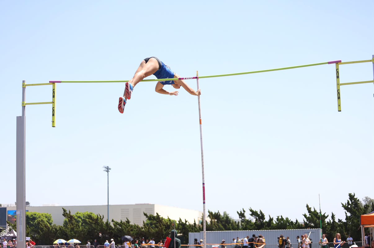 UCSB pole vaulter clearing the bar during competition