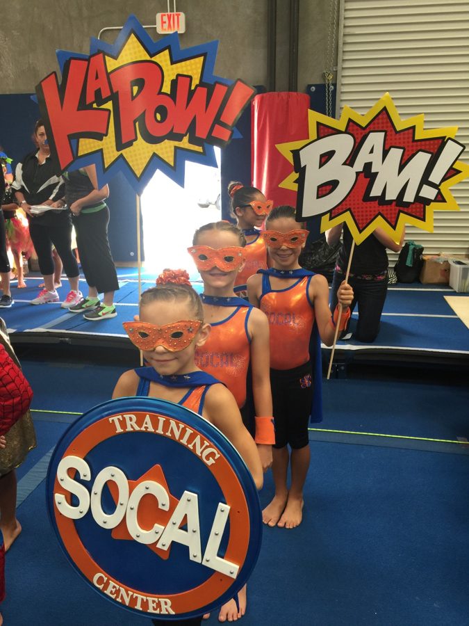 SoCal athletes posing with their team sign at a meet