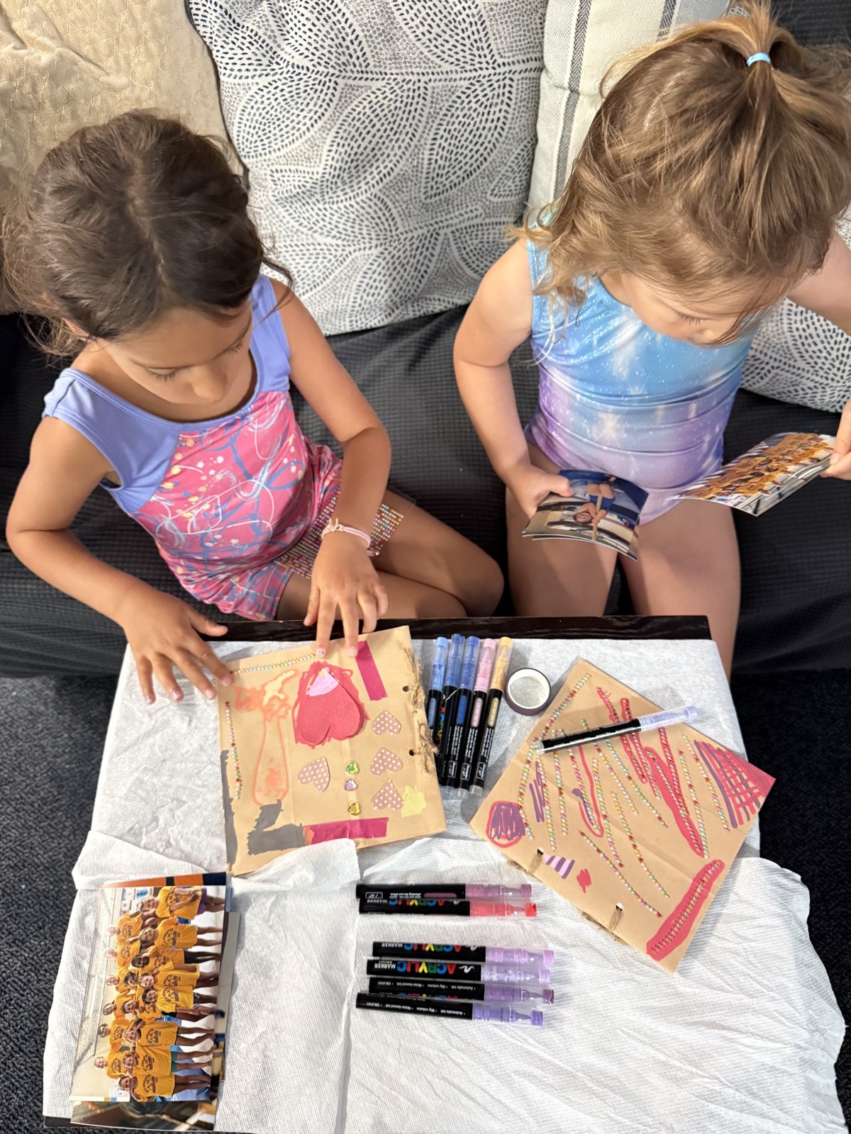 Two young athletes doing crafts