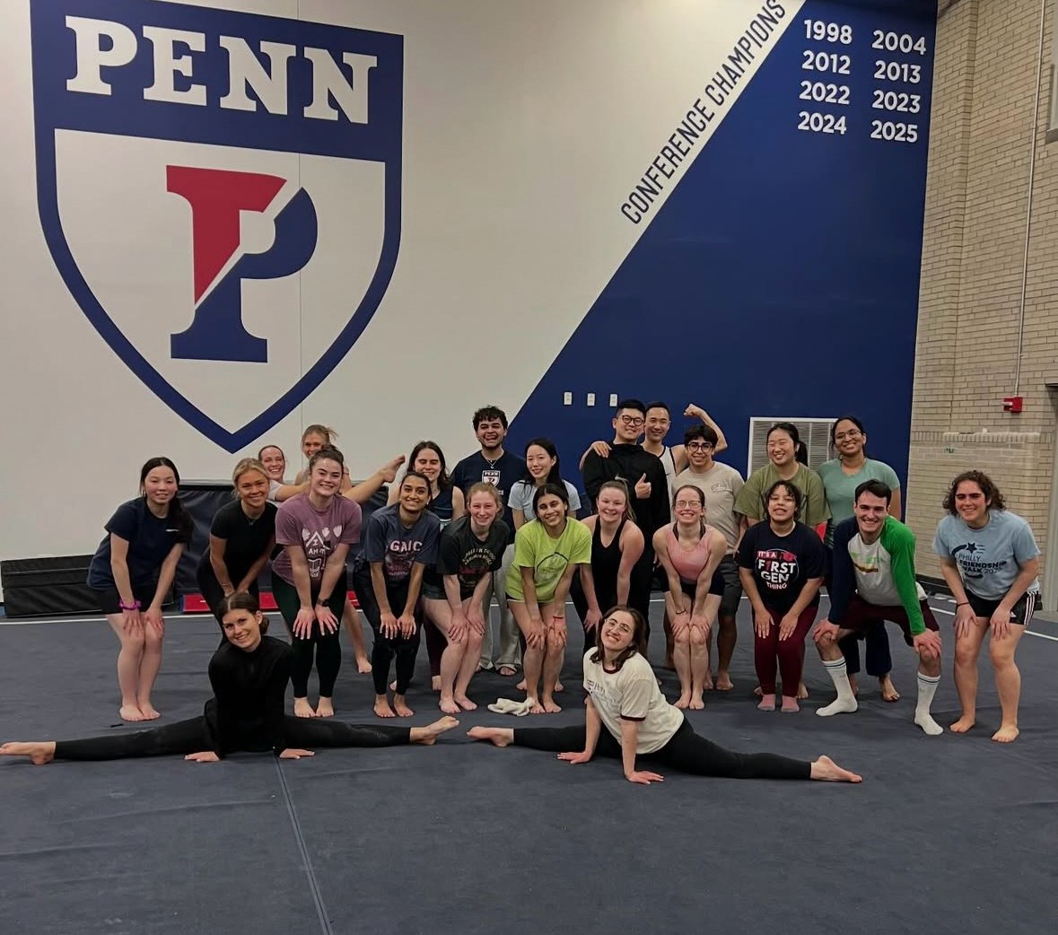 University of Pennsylvania gymnastics club group on the gym floor